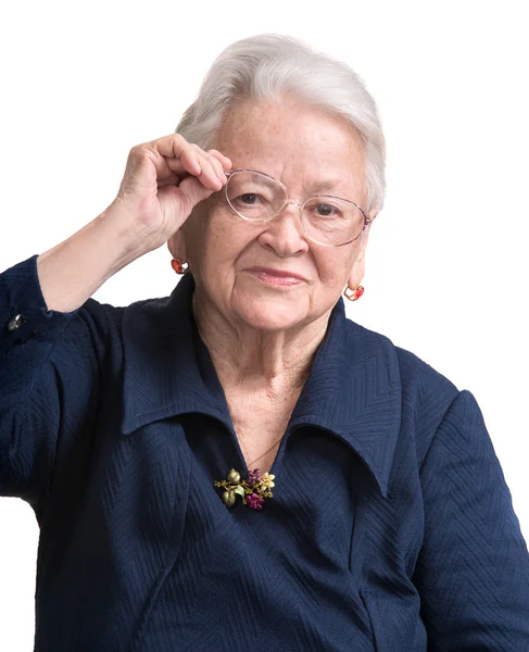 Lachende oude vrouw in glazen — Stockfoto