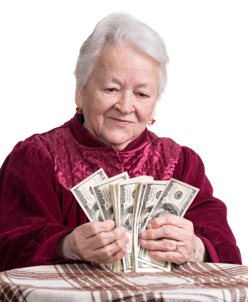 Smiling old woman holding money — Stock Photo, Image