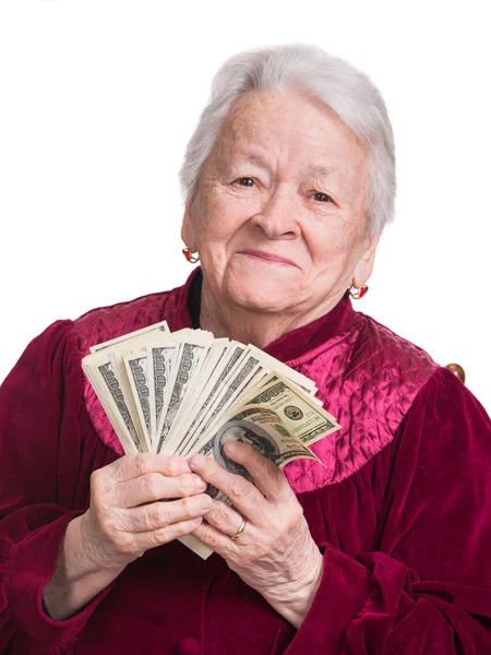 Smiling old woman holding money — Stock Photo, Image