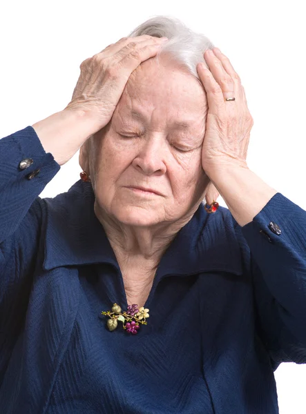 Gammal kvinna lider av huvudvärk — Stockfoto