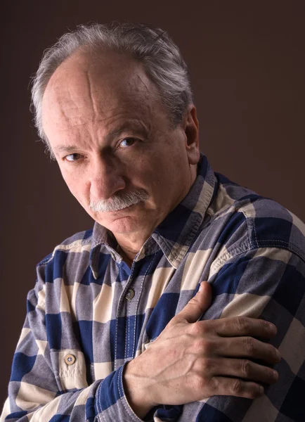 Pensive elderly man — Stock Photo, Image