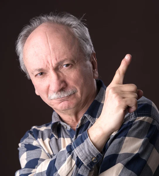 Elderly man pointing up — Stock Photo, Image