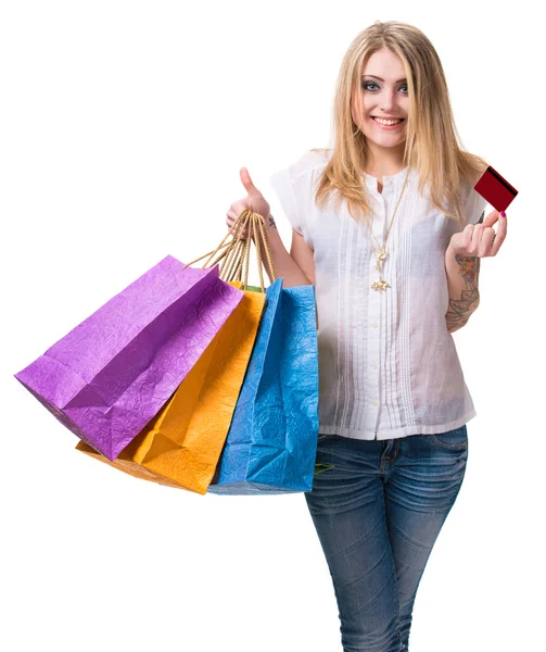 ショッピング バッグやクレジット カードで幸せな女の子 — ストック写真