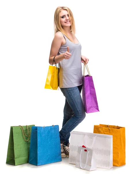 Glückliches Mädchen mit Einkaufstaschen — Stockfoto