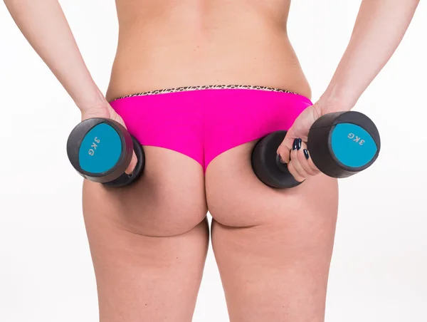 Overweight woman exercising with dumbbells — Stock Photo, Image