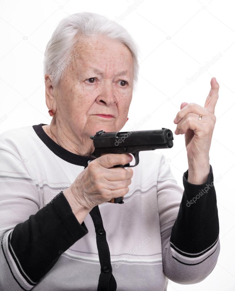 Old woman with pistol 