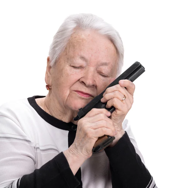 ピストルを持つ古い女性 — ストック写真