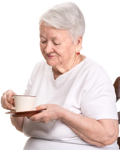 Vieille femme dégustant café ou thé tasse — Photo
