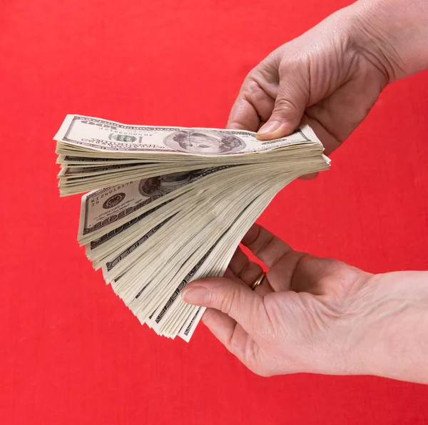 Dollars in woman's hands — Stock Photo, Image