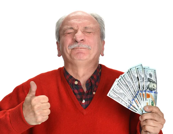 Viejo afortunado sosteniendo billetes de dólar — Foto de Stock