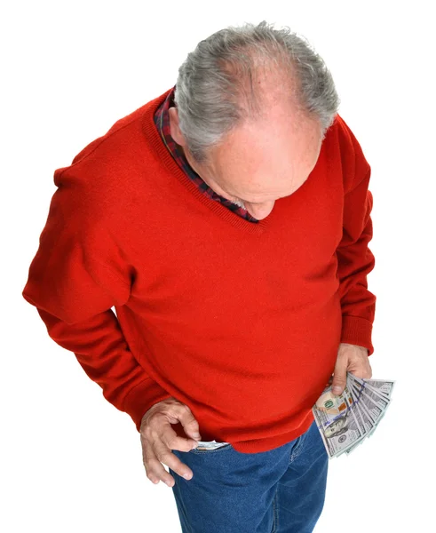 Hombre recibiendo billetes de dólar del bolsillo —  Fotos de Stock