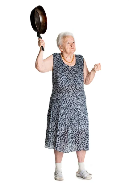 Bir tavada kızgın yaşlı kadınla — Stok fotoğraf