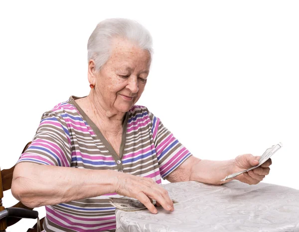 Yaşlı kadın para sayma — Stok fotoğraf