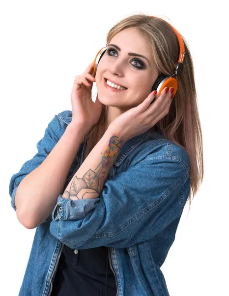 Lächeln junge Mädchen mit Kopfhörern — Stockfoto