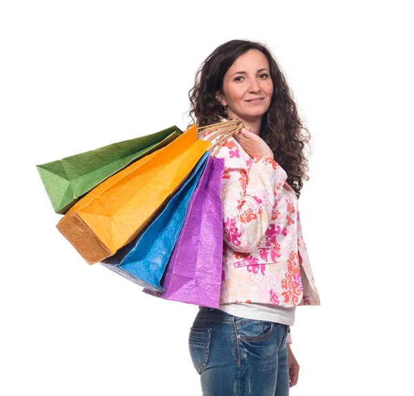 Χαμογελαστή γυναίκα με τσάντες ψώνια — Φωτογραφία Αρχείου