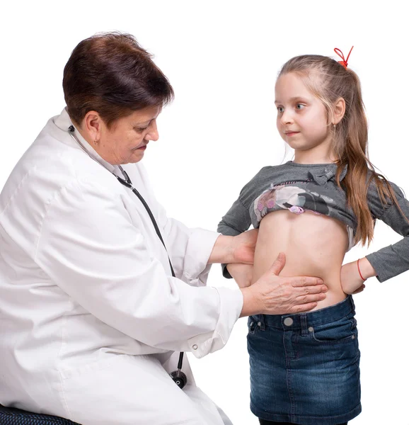 Senior pediatrician examining girl — Stock Photo, Image