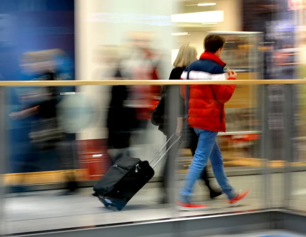 stock image People silhouettes in shopping mal