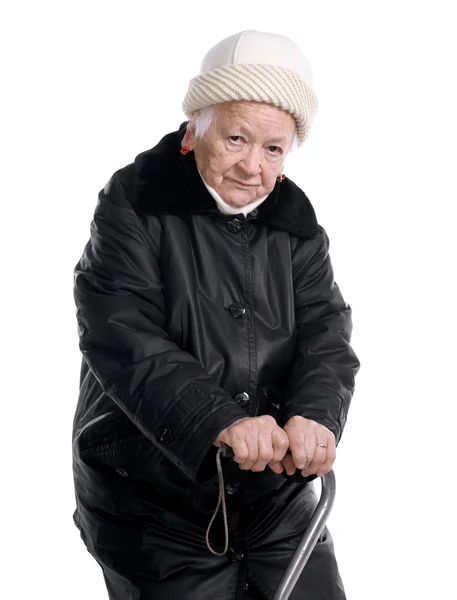 Alte Frau mit einem Stock — Stockfoto
