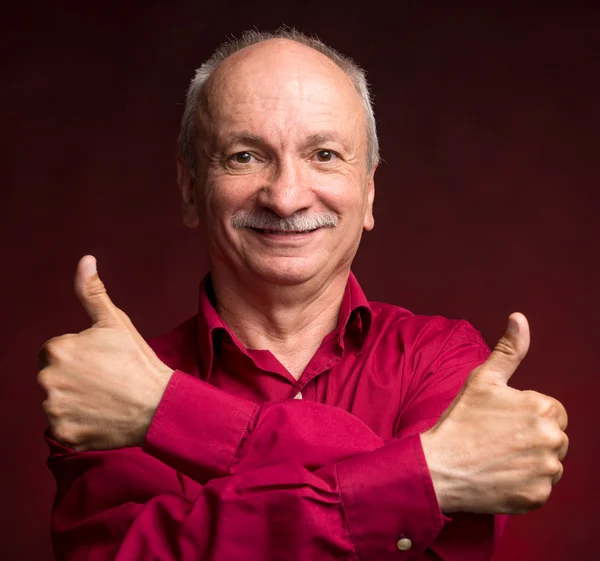 Elderly man shows ok sigh — Stock Photo, Image