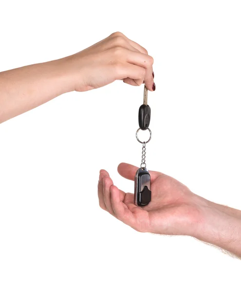 Woman giving car key to man — Stock Photo, Image