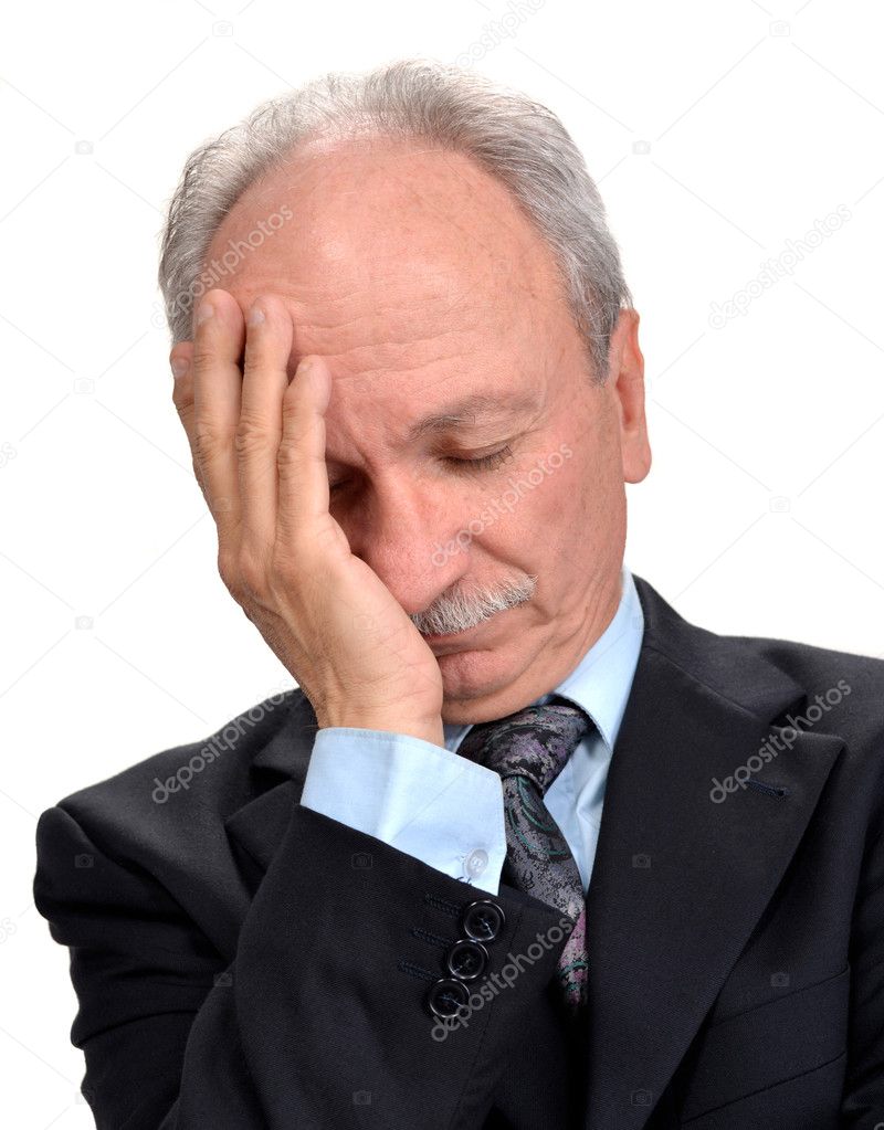 Senior businessman having headache