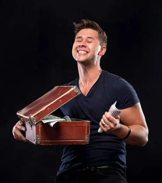 Happy Man Holding Suitcase Full Money Isolated Black Background — Stock Photo, Image