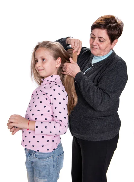 Grandmother Combing Her Beautiful Granddaughter White Background — Stock Photo, Image