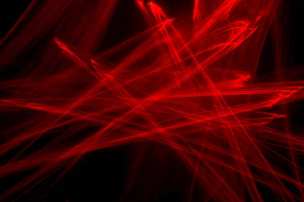 Abstracte Rode Lijnen Getekend Door Licht Een Zwarte Achtergrond Laserlijnen — Stockfoto