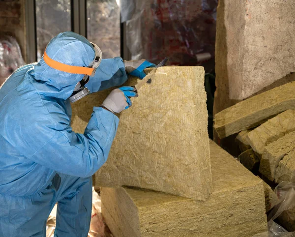 Attic Renovation Insulation Concept Worker Uniform Cutting Mineral Wool Panels — Stock Photo, Image