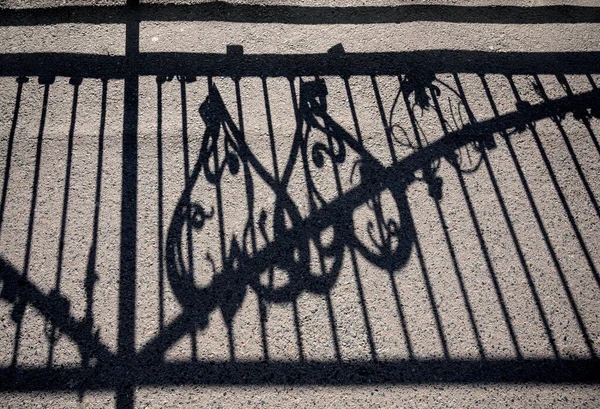 Geometric Pattern Fence Shadow Sidewalk — Stock Photo, Image