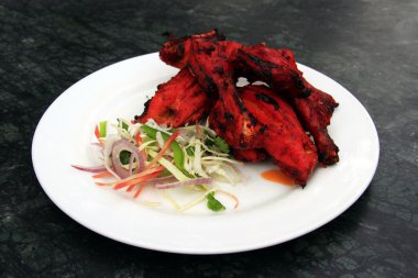 Indian cuisine: tandoori chicken clipart