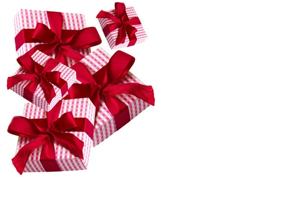 Corner of gift boxes with red bows — Stock Photo, Image