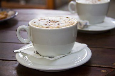 Two cups of cappuccino clipart
