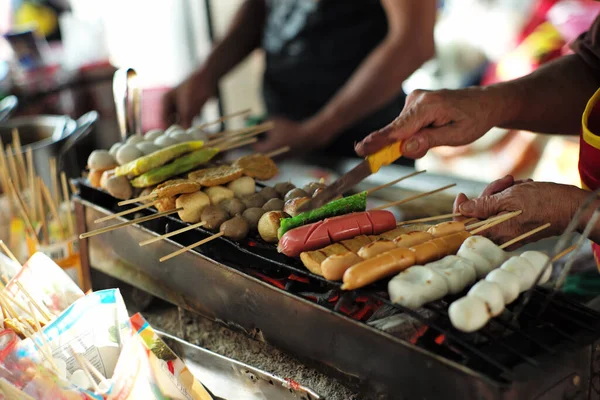 Closeup Various Types Balls Sausages Grilled Charcoal Motion Blurred Hand — Stock Photo, Image