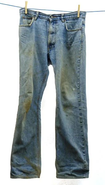 Blátivé džíny na prádelní šňůře Stock Fotografie