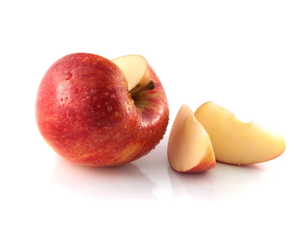 Isolated sliced red apple with two slices (wet) — Stock Photo, Image