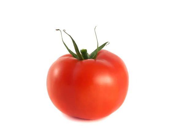 Isolierte rote reife Tomate auf weißem Hintergrund. — Stockfoto