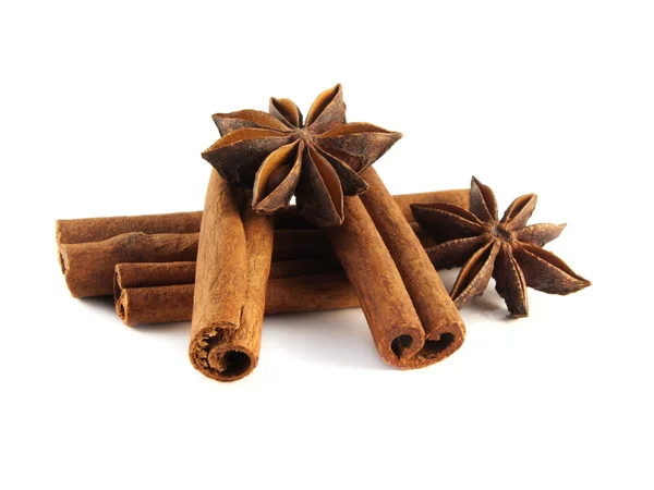Cinnamon sticks and anise stars. Isolated — Stock Photo, Image