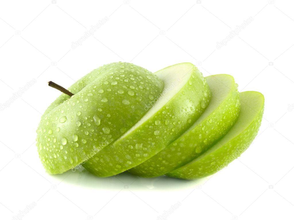 Isolated green apple slices with water drops Stock Photo by ©Blankstock  24489265