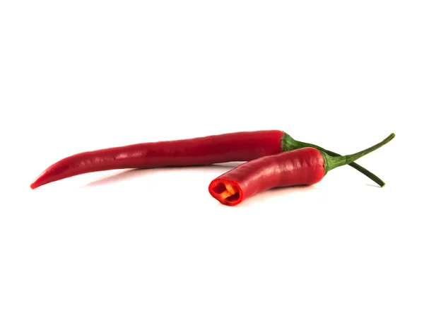 Szeletelt piros chili paprika, fehér háttér. — Stock Fotó