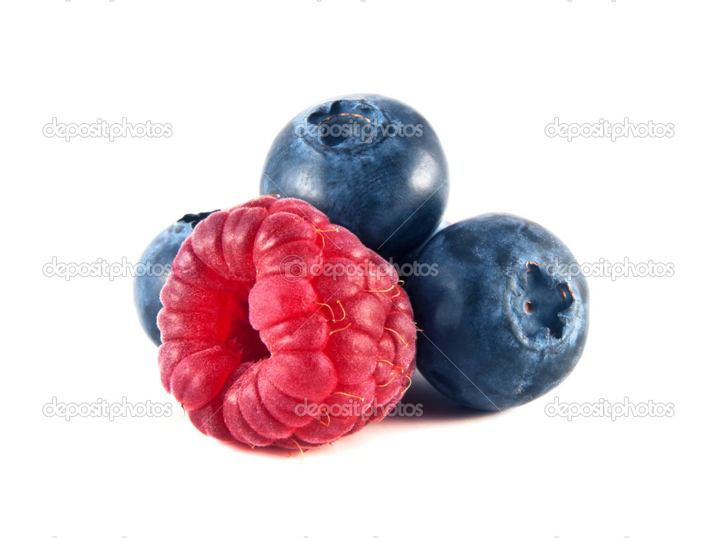 Fresh blueberries, raspberry isolated on white