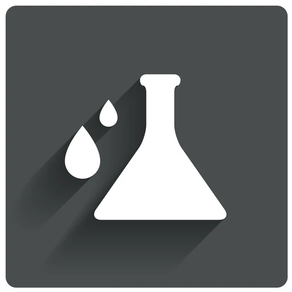 Icono de química. Bombilla de vidrio de laboratorio con gotas — Foto de Stock