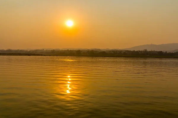 Sunset on Irrawaddy river — Stock Photo, Image