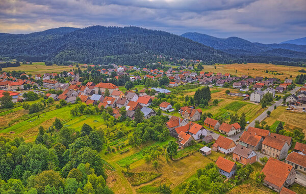 Aerial view of the small industrial village Ravna Gora village in western Croatia, located between Delnice and Vrbovsko in the mountainous region of Gorski Kotar.