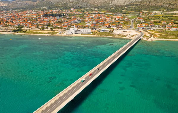 Aerial top view of a long bridge above a sea, island Ciovo in Croatia — Stock Photo, Image