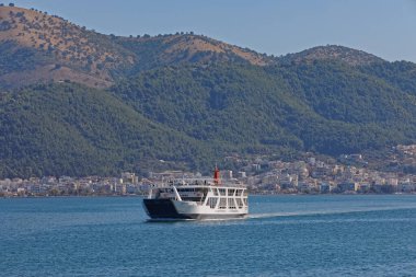 IGOUMENITSA, GREECE, SEPTEMBER 29, 2019: Lefkimmi lines ferry sailing infront of the old port in Ionian sea.