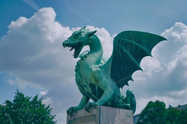 LJUBLJANA, SLOVENIA - AUGUST 25 2022: Dragons Bridge detail in city center.