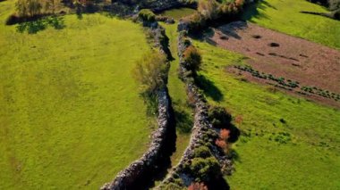 Aerial view of the plateau in the hinterland of Konavle near the village of Stravac, the wider area of Dubrovnik. Traditional drwall borders visible in the landscape.