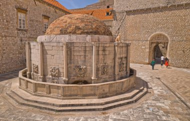 DUBROVNIK, CROATIA - APRIL 26 2022: Low height aerial view of the Onofrios faucet on Stradun or Plaza.