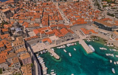 DUBROVNIK, CROATIA - APRIL 26 2022: The old town harbor aerial panoramic view.